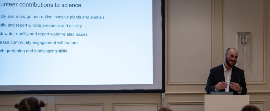 Jacob White speaking at the event