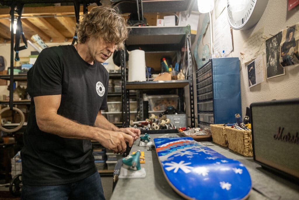 Rodney Mullen working on a skateboard